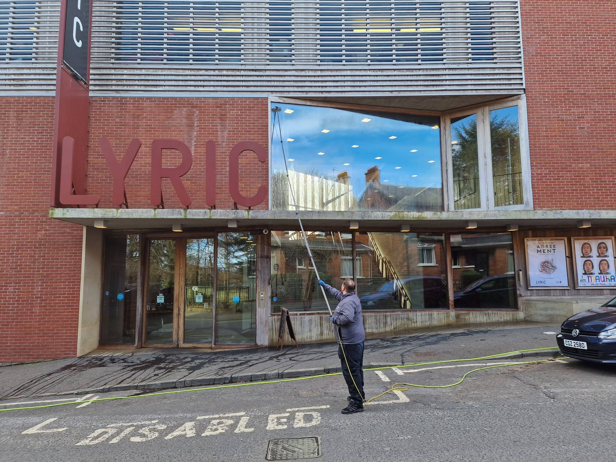 C-thru Window Cleaning Specialists cleaning the Lyric Theatre in Belfast