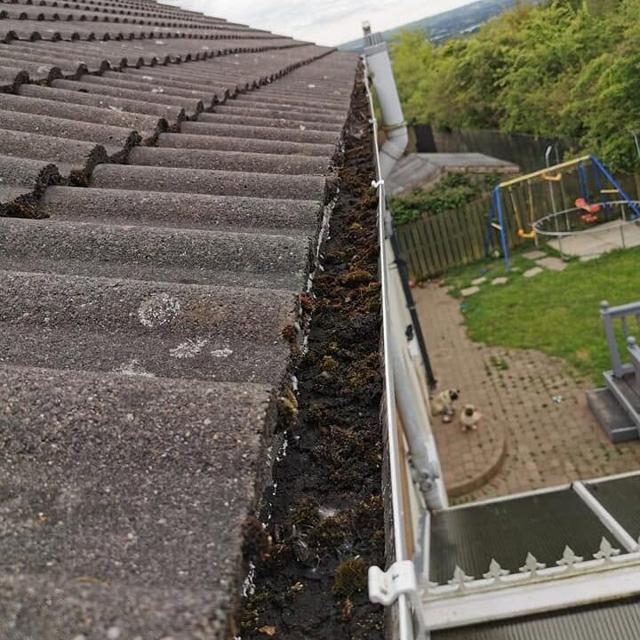 Before deep gutter cleaning services in Belfast, Northern Ireland